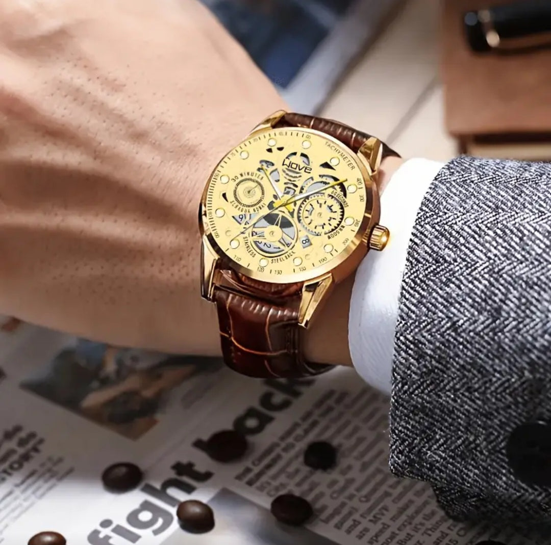 SKELTON GOLDEN TONE WAVE WATCH